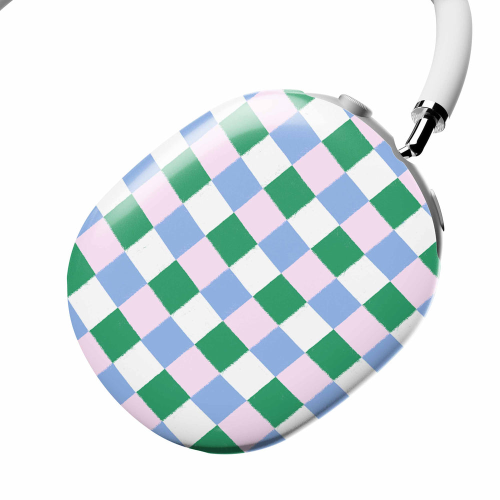 Casetify Checkered headphones with green, blue, and pink pattern on a white background