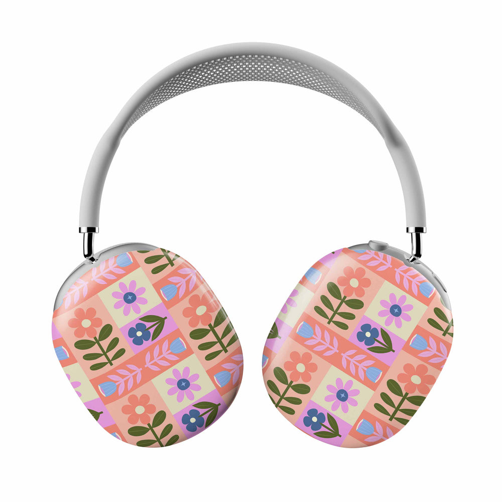 Casetify Headphones with floral patterned cases on a white background