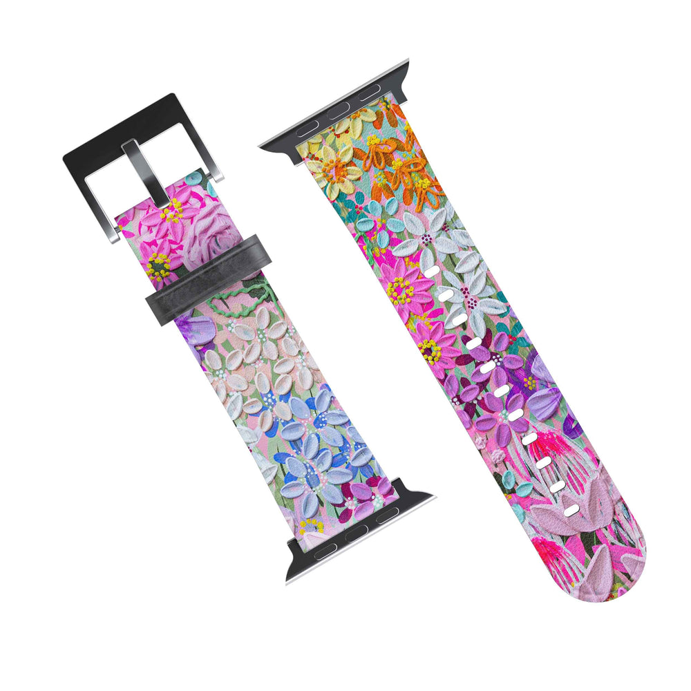 A multicolored floral-patterned Apple Watch band with a metal clasp, designed by Alex Mason.