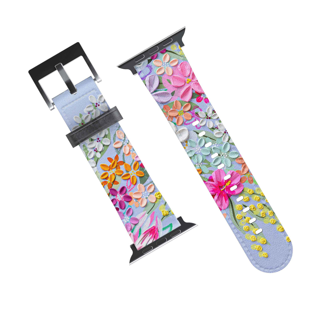 A multicolored floral Apple Watch band with a digital display showing the time.
