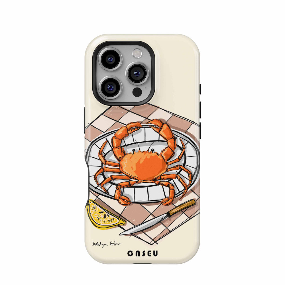 Phone case with a crab design on a beige background