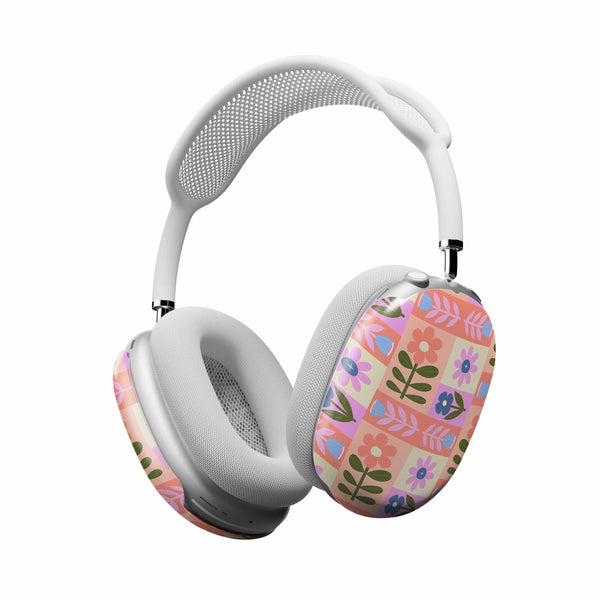 Casetify White headphones with a floral design on a white background