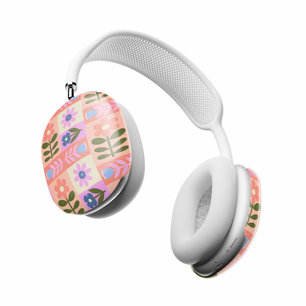 Casetify White headphones with floral design on a white background