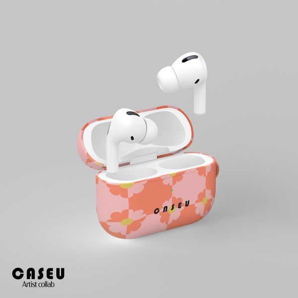 Wireless earbuds in a pink floral case with 'Casetify' on a gray background