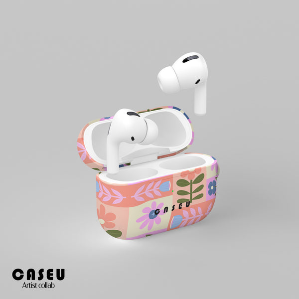 Wireless earbuds with a floral case on a gray background, featuring the brand 'CASEU'.