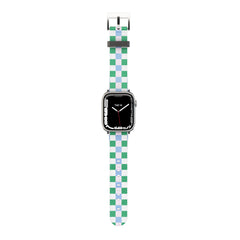 Smartwatch with a green and light blue & pink checkered band on a white background