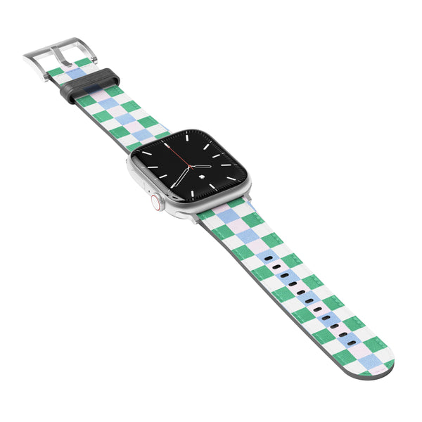 Smartwatch with a green and blue & pink checkered band on a white background